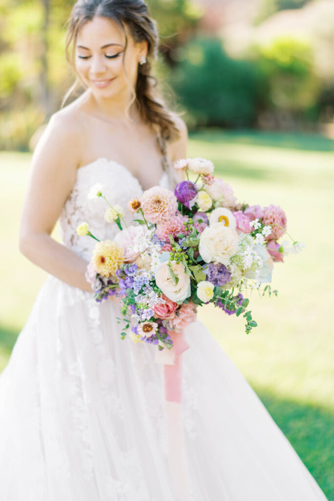 colorful california bridal session close up of floral arrangement bride