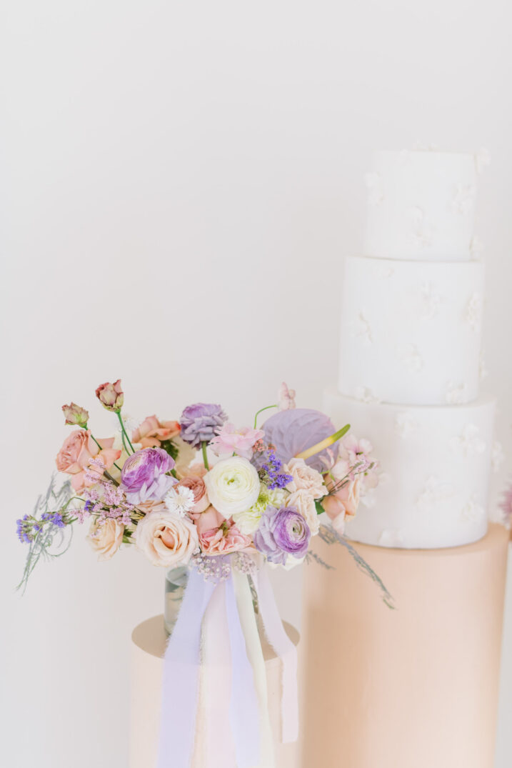 arlo austin wedding cake with Unforgettable Floral flower arrangement