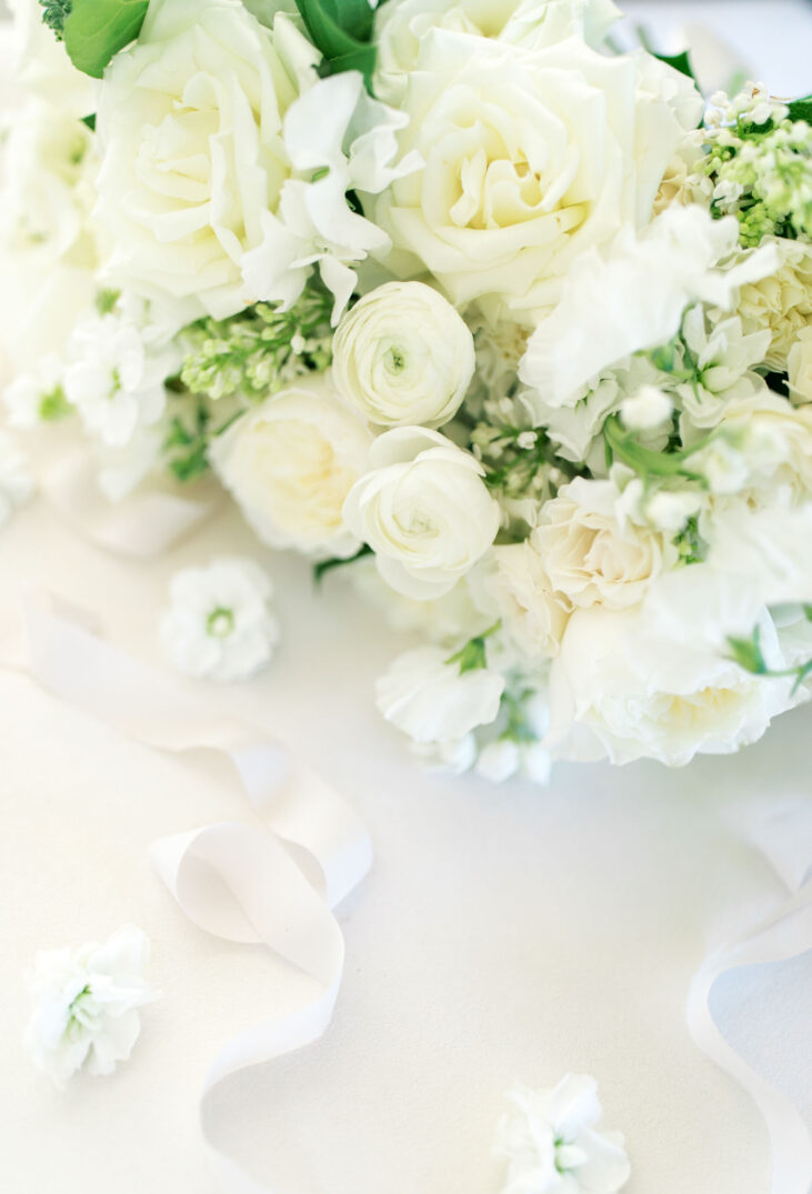 classic all white floral arrangement for a Houston winter wedding