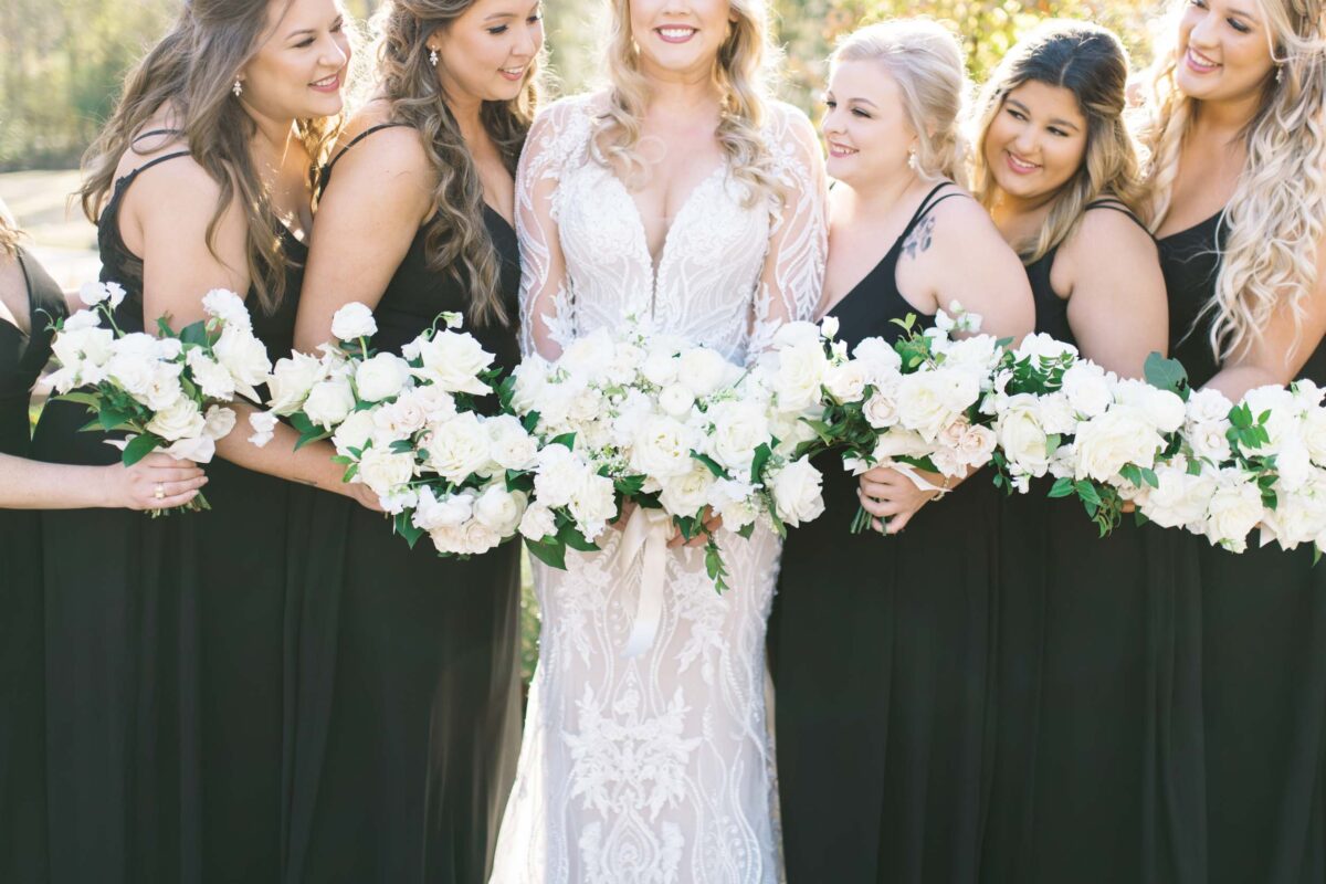 Houston bride at The Luminaire wearing a long sleeve lace wedding dress