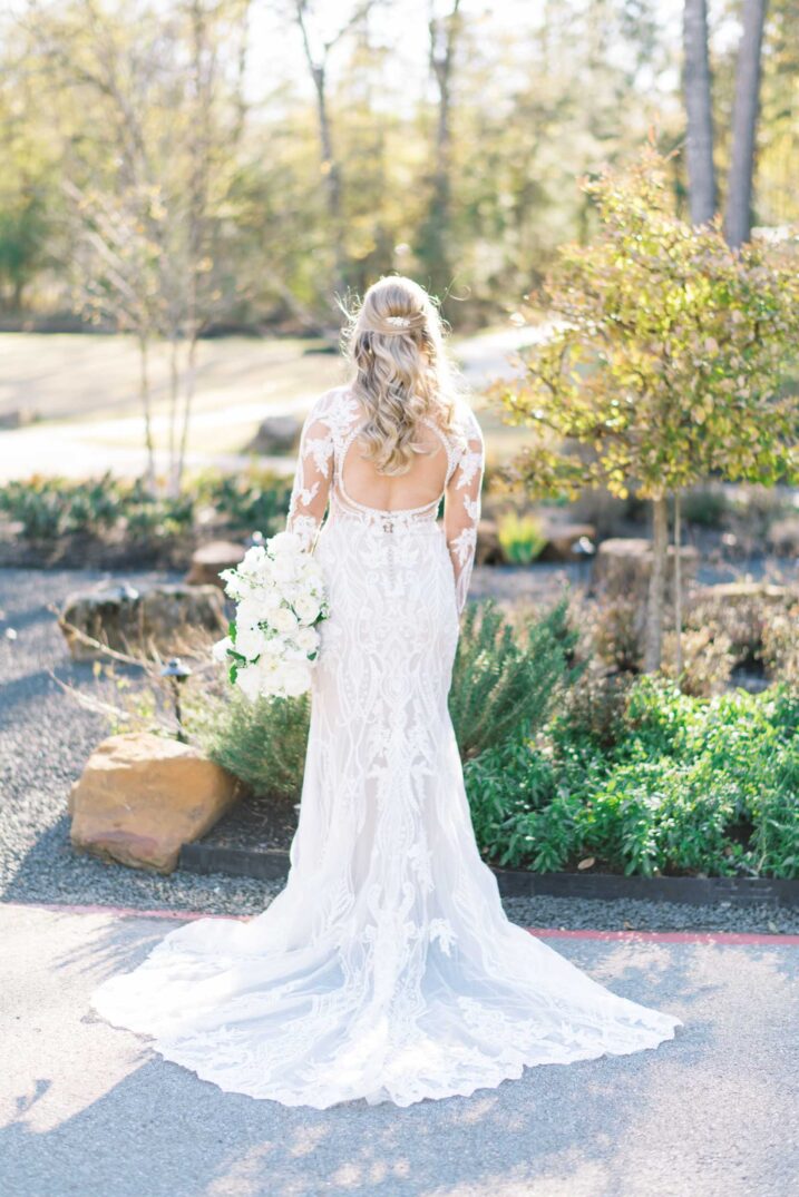 The Luminaire outdoor wedding dress  with large lace pattern and open back