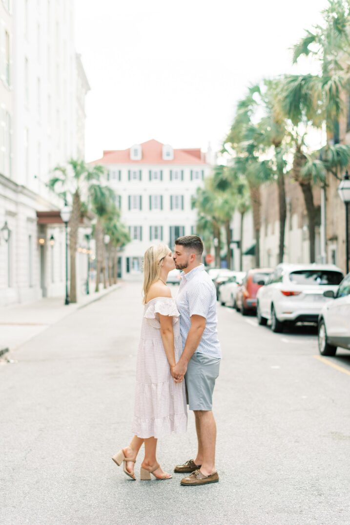 charleston engagement couple kissing in the middle of the street 