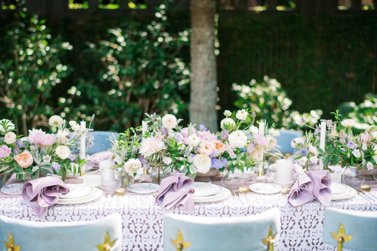 Charleston feminine pastel editorial beautiful table setting with summer florals