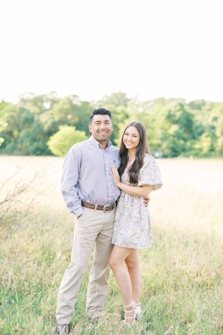 mckinney falls engagement session in an open field