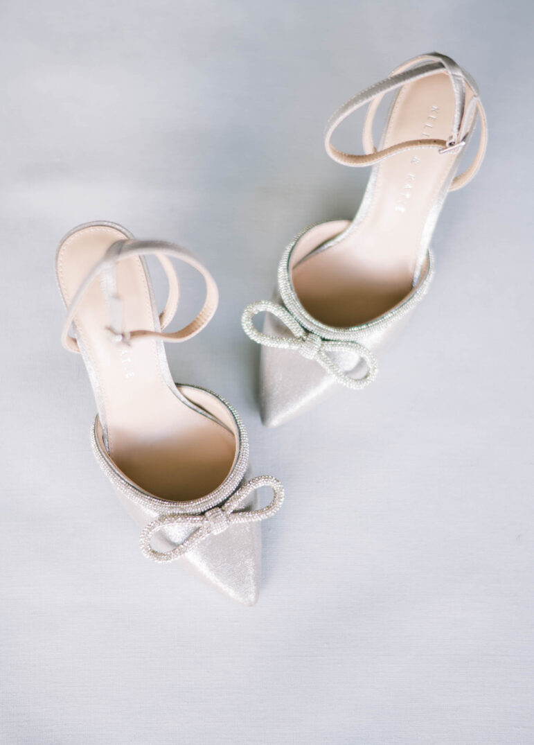 silver pointed wedding heels with small bows