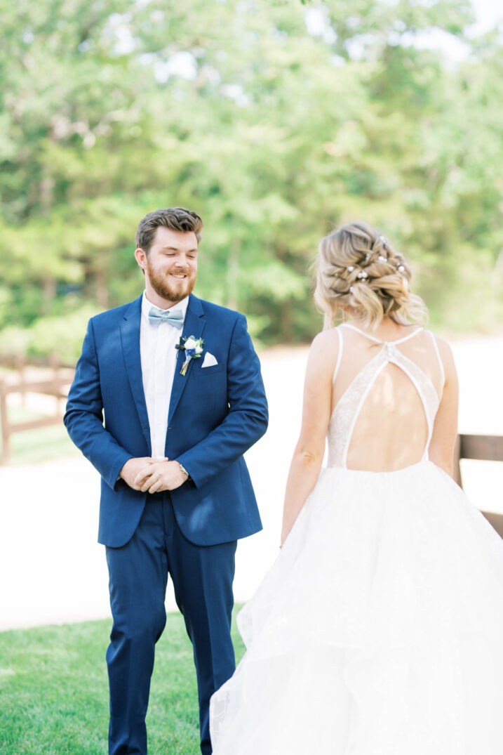 first look with bride and groom at Peach Creek Ranch in College Station, Texas