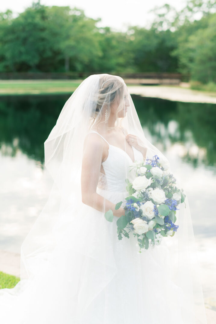 timeless texas spring wedding outdoor veil lake background