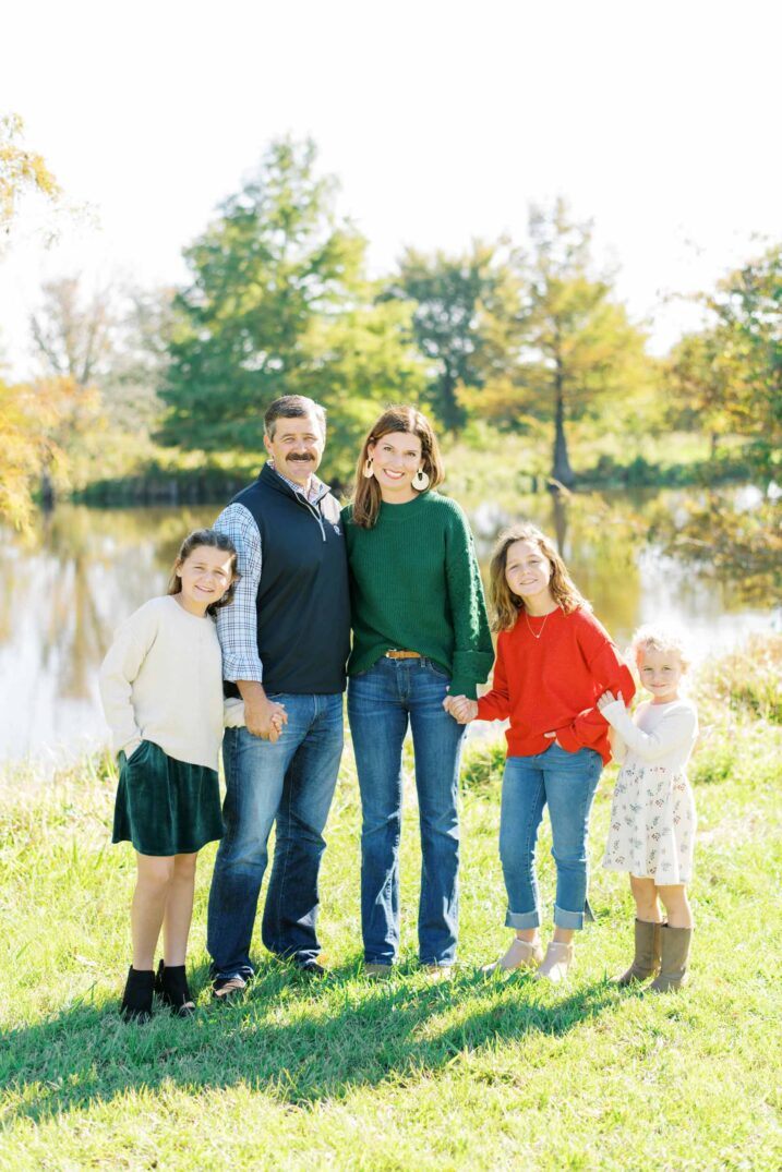 Christmas card family photos outdoor by a lake in College Station, Texas