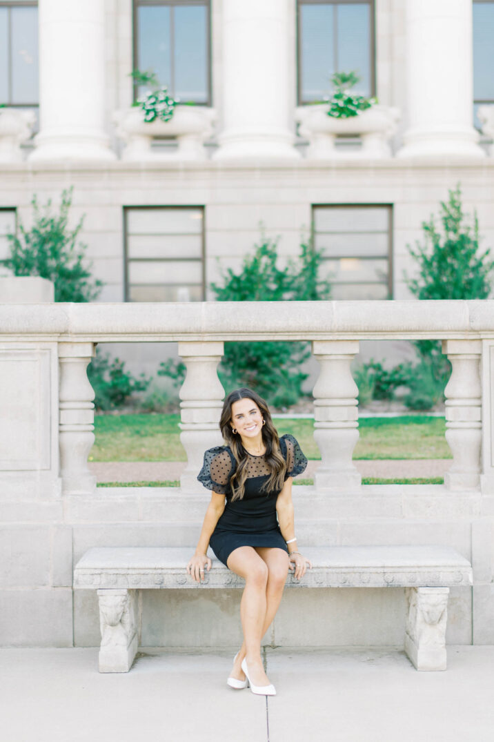 sitting down pose in front of Texas A&M Administration Building