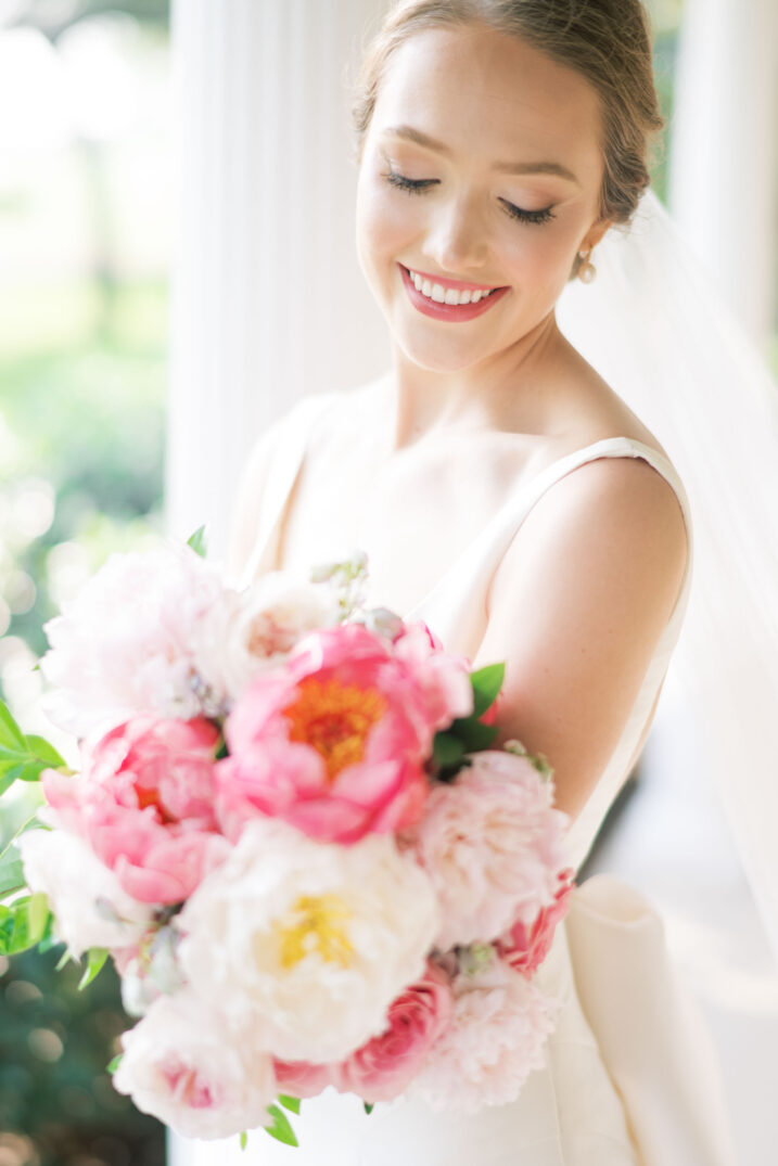 hill country bridal portrait with pink and white peonies bouquet