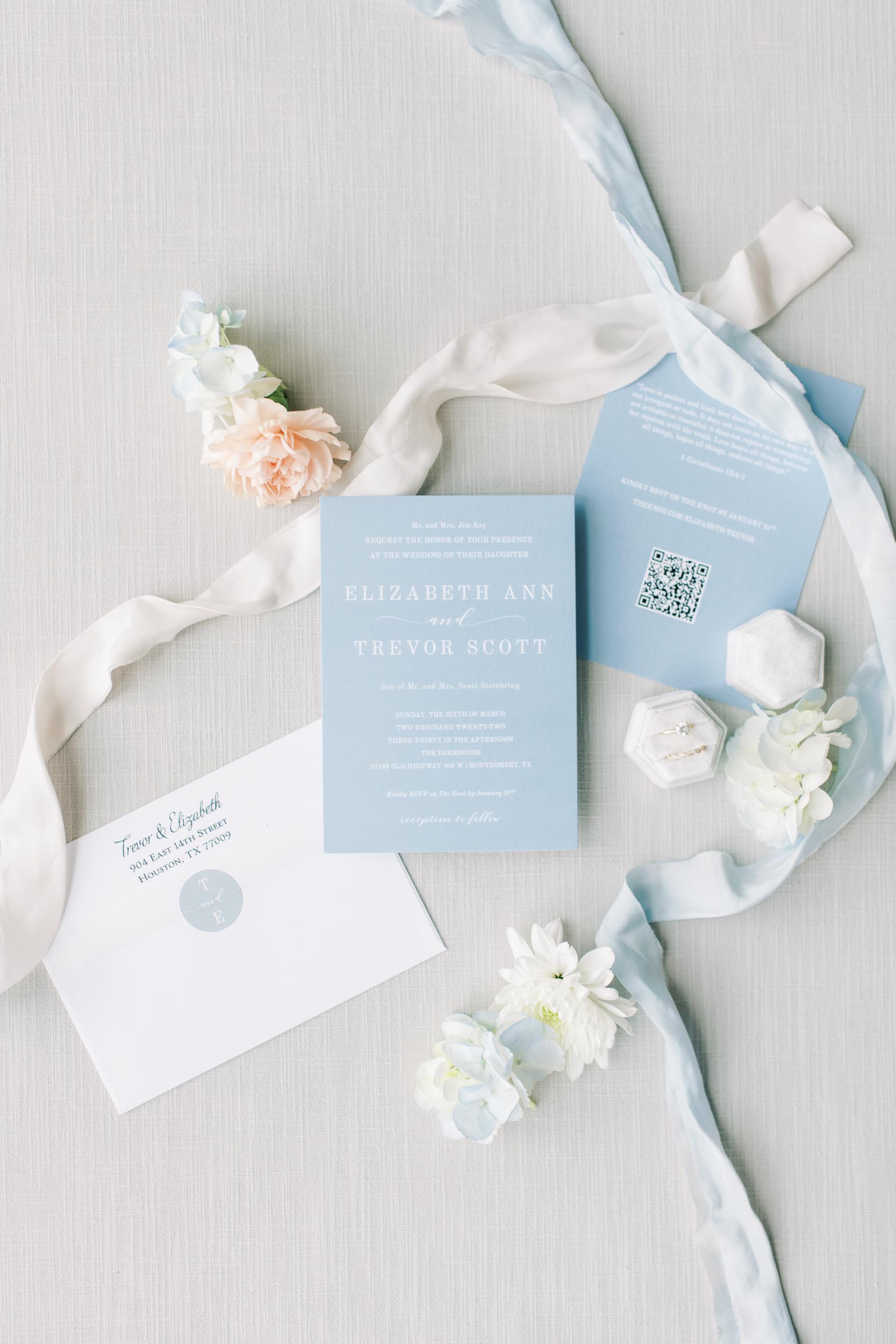 blue invitation suite with ribbon for farmhouse wedding Houston