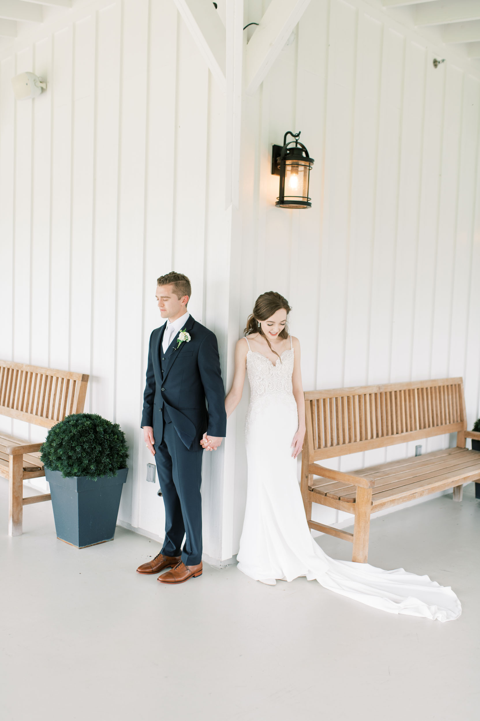 bride and groom at The Farmhouse venue in Montgomery, Texas for their first touch