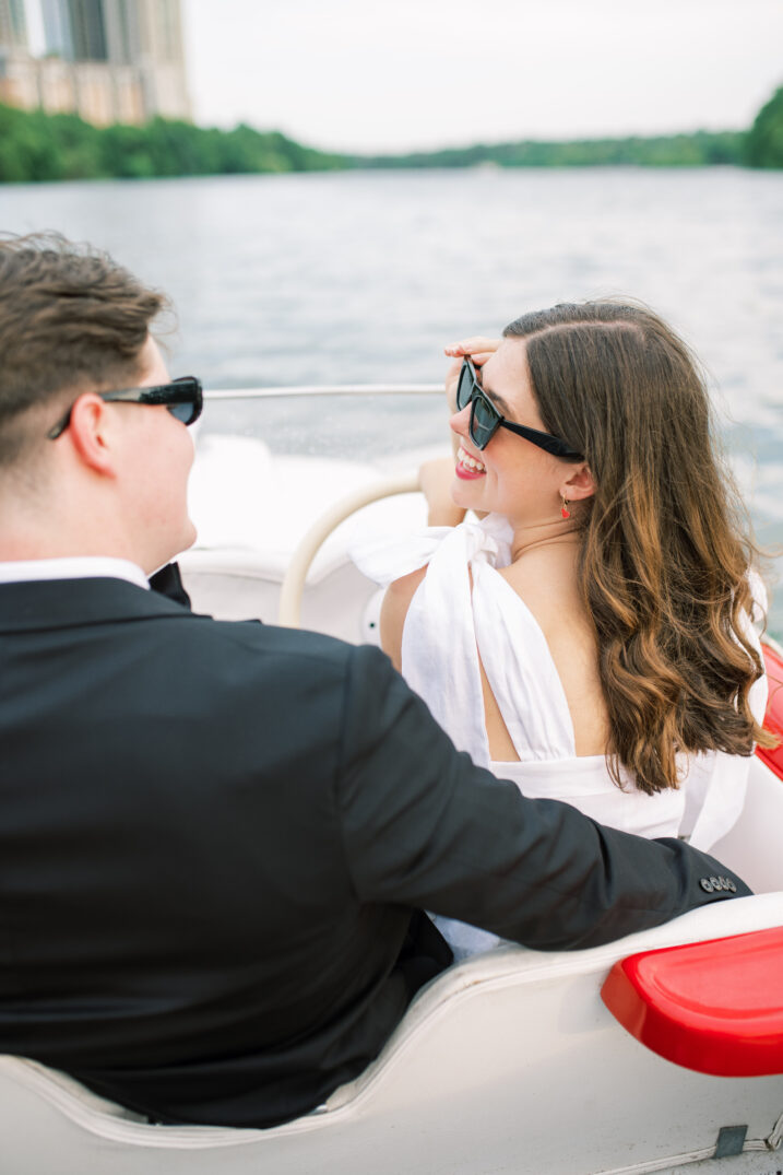 town lake engagement on vintage boat