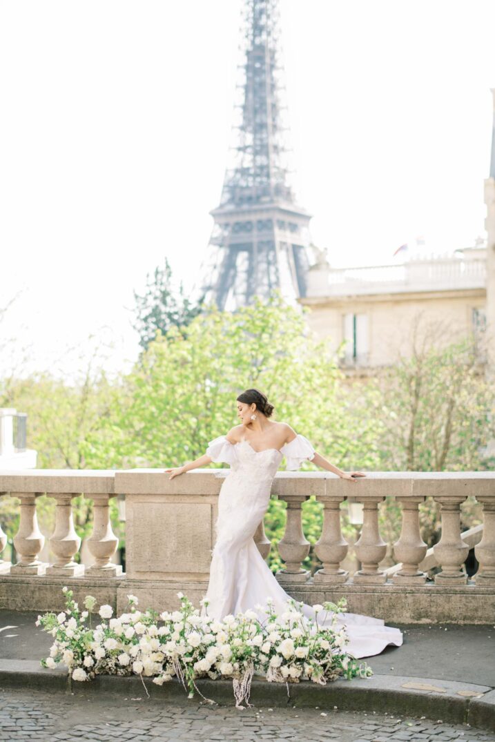 bridal portrait on the street in front of the Eiffel Tower