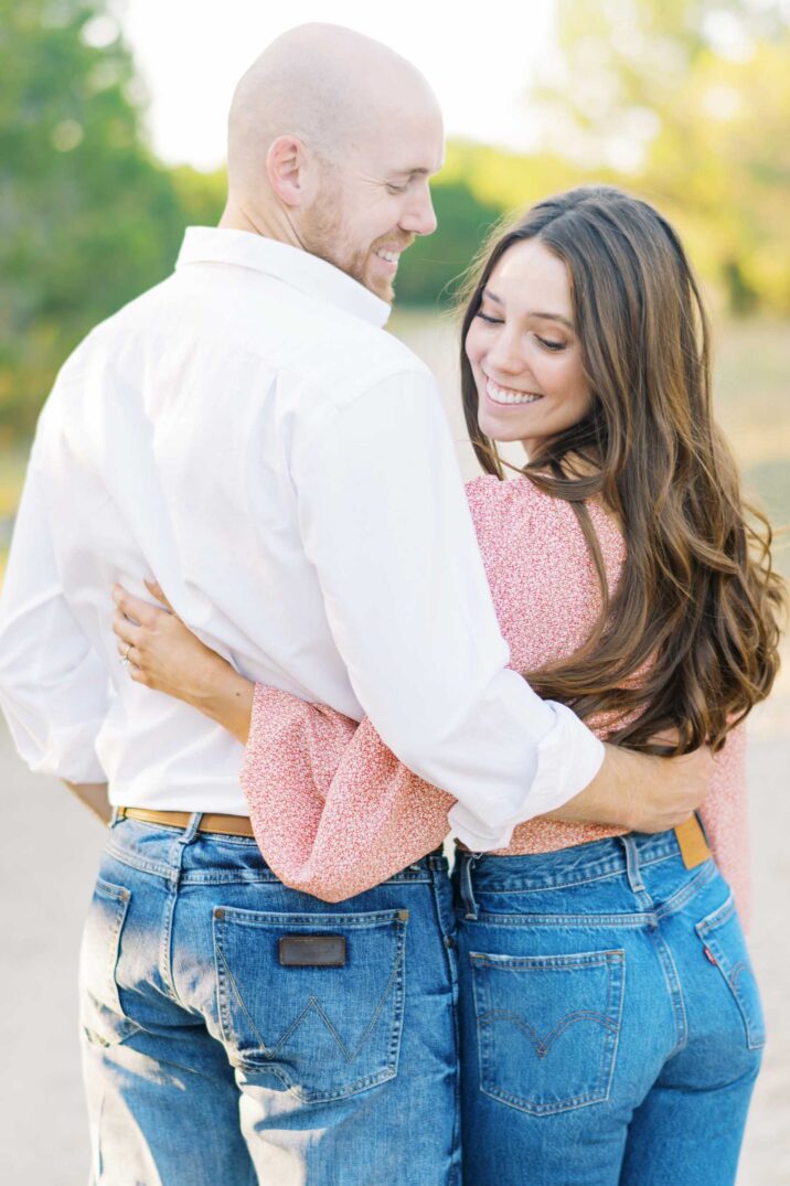 couple wearing denim jeans in engagement photos