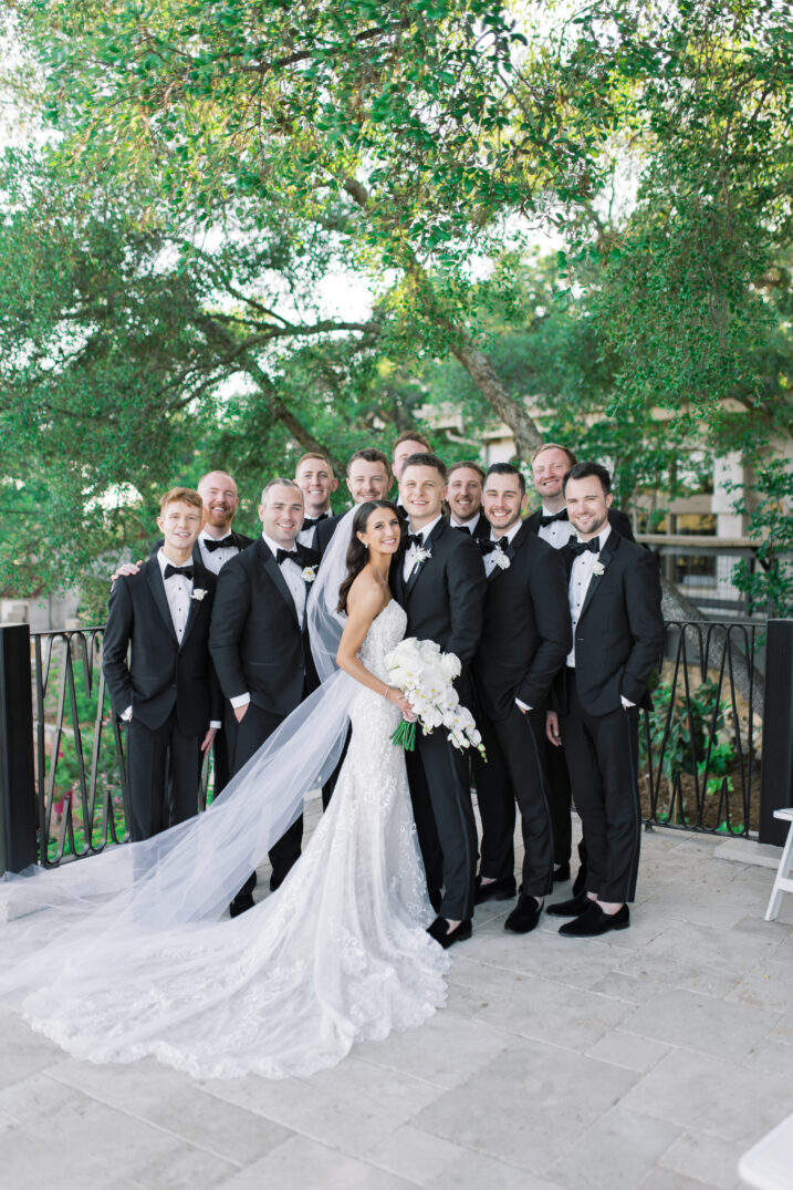 bride and groom with groomsmen black and white inspired wedding fresh