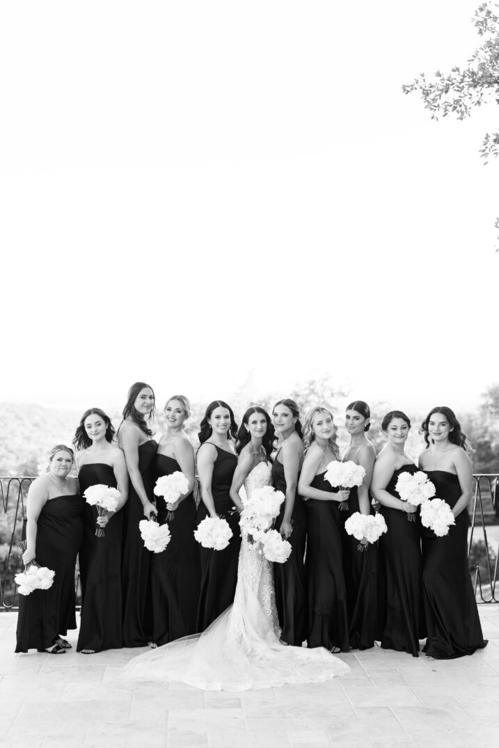 black and white photo bridesmaid with bride wedding dress Italian inspired wedding