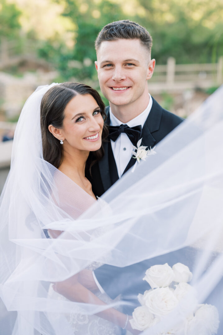 bride and groom veil black and white man and wife joyful fashion-inspired
