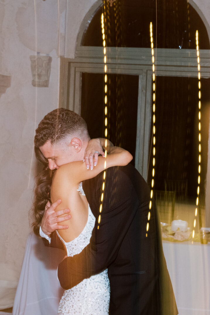 hug bride and groom final dance double exposure Italian inspired wedding dress 