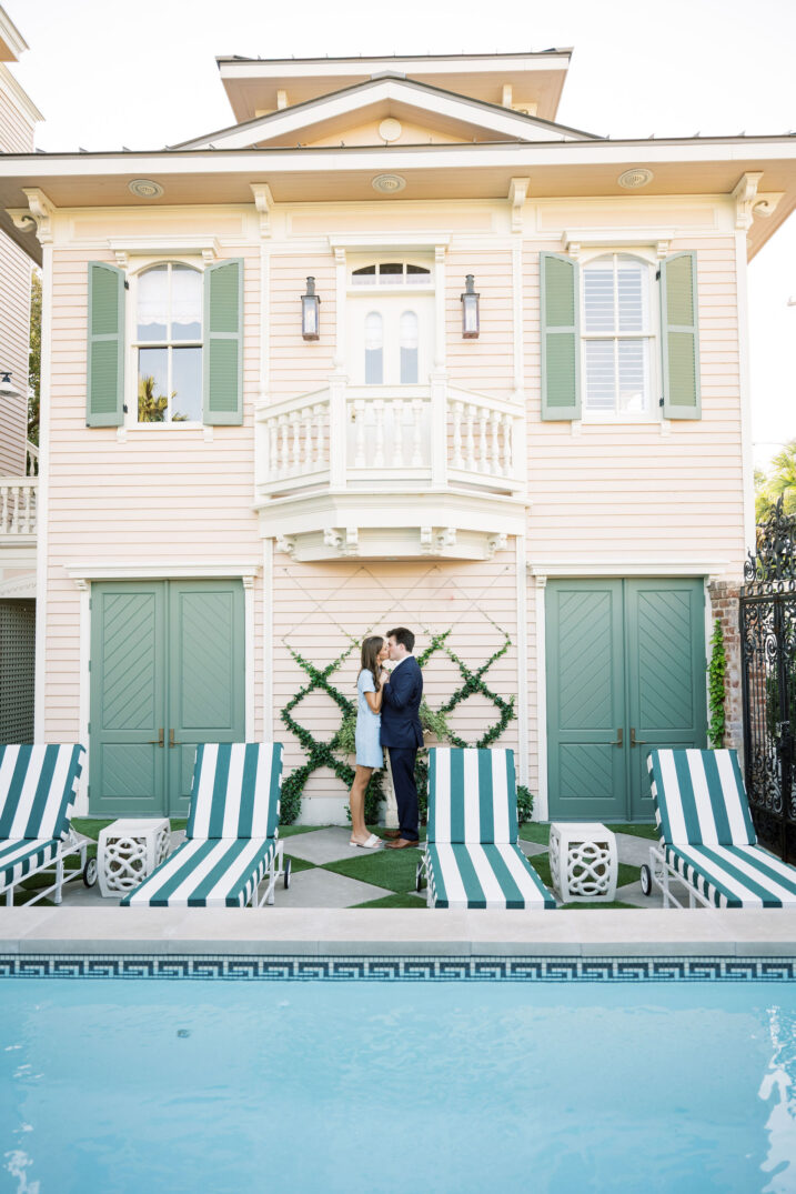 couple kissing by texas pool