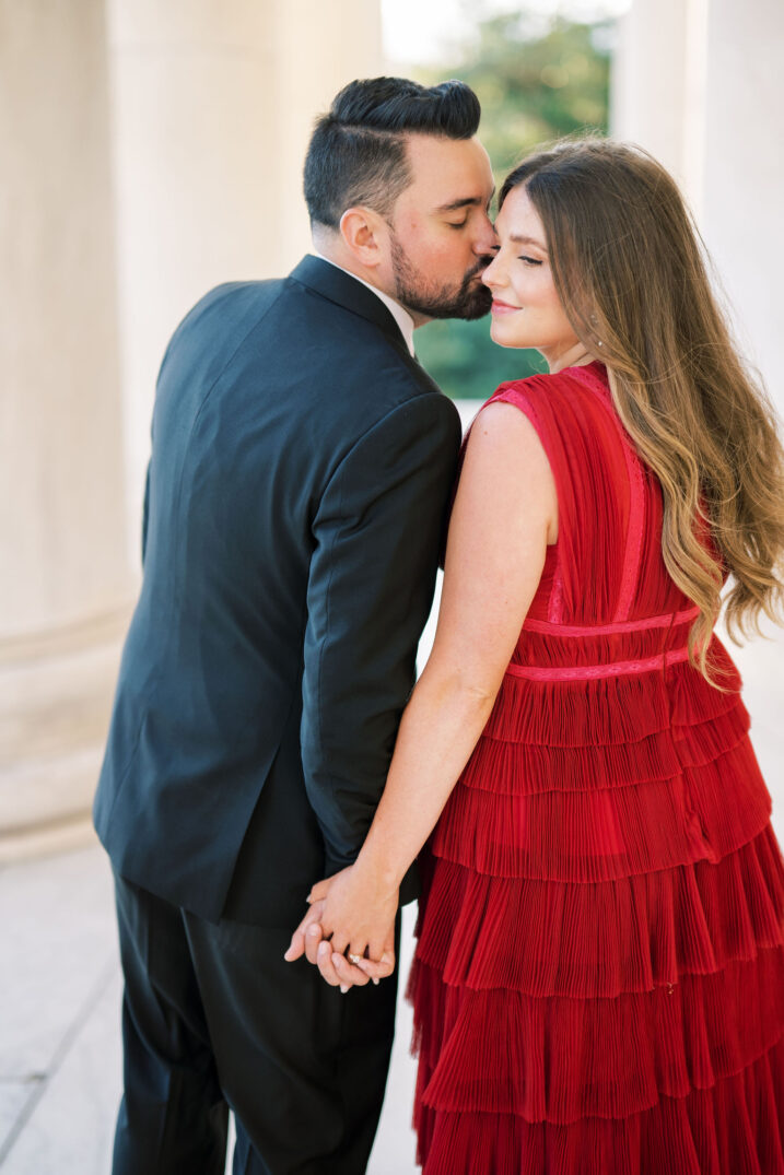 boy kissing girl on cheek